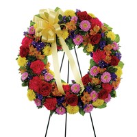 Multi-color standing sympathy wreath of flowers from Ingallina's Gifts